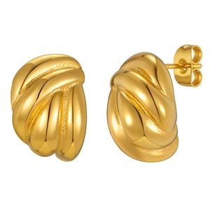 Golden teardrop curved hoop earrings with polished twisted texture on a white background