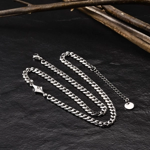 Silver cuban chain bracelet for men with a sparkling star charm and lobster clasp closure