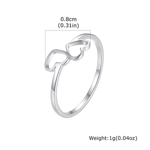 Detail view of double heart open ring showing 0.8cm width and 1g weight specs