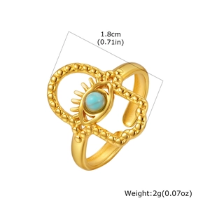 Macro shot of turquoise evil eye ring in gold showing diameter and weight measurements