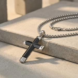 Men's stainless steel cross pendant necklace with black enamel inlay on stone surface