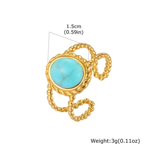 Detail of 1.5cm turquoise stone on gold twisted band ring weighing 3g with size labels