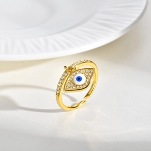 Gold plated evil eye open ring with micro-pave cubic zirconia on ceramic plate