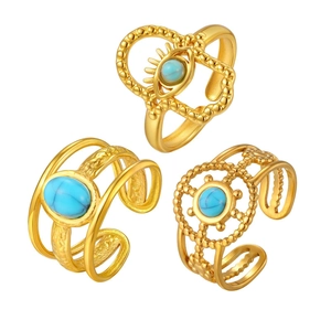 Three-piece set of gold-plated rings with turquoise stones and bohemian evil eye designs