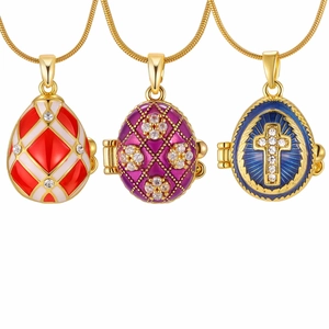 Vintage Faberge style red and blue enameled egg pendant necklaces with gold chains