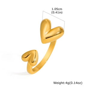 Detail view of gold heart ring showing dimensions 1.05cm and 4g weight on white background