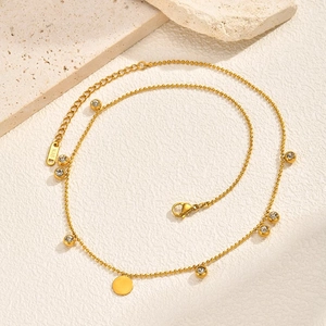 Elegant gold beaded chain necklace with zircon disc charms and K18 metal tag