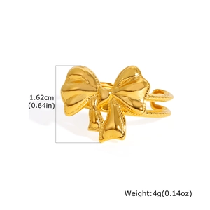 Detail showing gold bow ring with dimension 1.62cm and 4g weight on white background