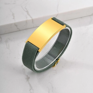 Minimalist gold stainless steel curved plate bracelet with olive green elastic band