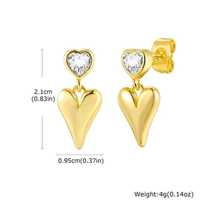 Detail view of gold heart drop earrings with cubic zirconia and dimensions