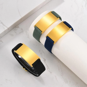 Minimalist elastic watch band bracelets in green, blue, and black with gold metal plate