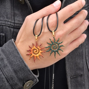 Stainless steel sun pendant necklace with colorful enamel spiral and black leather cord