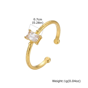Detail view of hammered gold ring featuring rectangular zircon and 0.7cm stone size info