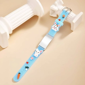 Detailed view of light blue silicone kids bracelet with rabbit charms and metal plaque