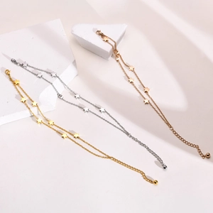 Double-layered stainless steel star bracelets in gold, silver, and rose gold finishes