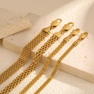 Detail showing four widths of golden mesh chain bracelets with secure lobster clasps