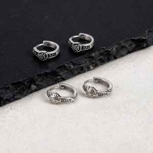 Punk style stainless steel hoop earrings with Viking Valknut and wolf head symbols