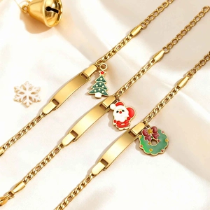 Golden stainless steel bracelets with ID plate and festive Christmas tree charms