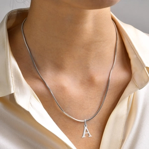 Minimalist silver stainless steel snake chain necklace with uppercase letter A pendant