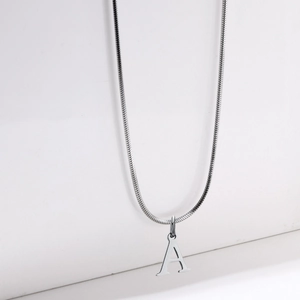 Silver stainless steel snake chain necklace with a polished capital letter A pendant