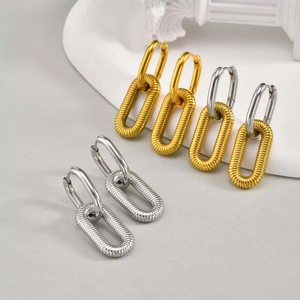 Oval linked stainless steel hoop earrings in gold, silver and mixed tones in a group view