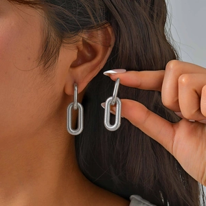 Silver stainless steel oval hoop earrings with twisted spiral texture for women