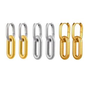 Three pairs of oval gold and silver stainless steel earrings with spiral textured link design