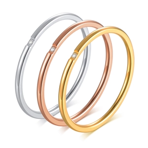 Three-piece minimalist 1mm stainless steel rings set in gold, silver, and rose gold with zircon