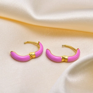 Chic gold-plated hoop earrings featuring smooth pink enamel on luxurious silk background