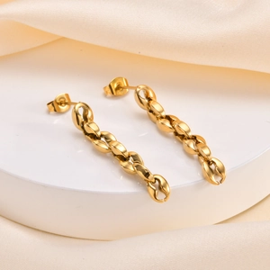 Elegant gold-plated stainless steel coffee bean chain drop earrings on white ceramic base
