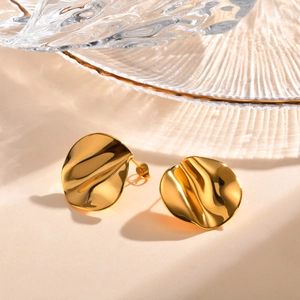 Golden irregular wavy disc earrings with a high-polished metallic finish for women