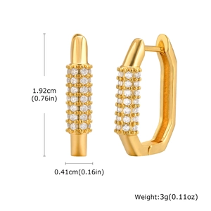 Detail view of hexagonal gold earrings with micro-pave zircon settings and dimensions