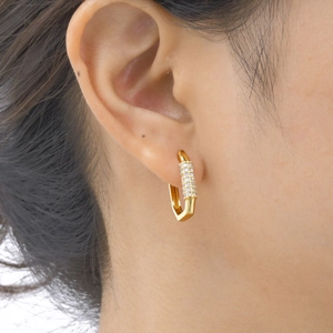 Elegant gold-plated geometric hoop earrings with pavé cubic zirconia on model