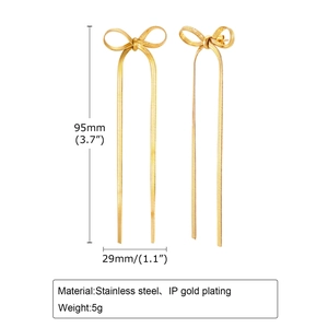 Detail showing dimensions and 95mm length of gold bow tassel earrings in stainless steel