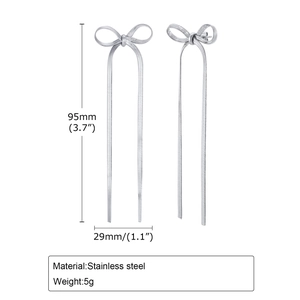 Detail of silver long tassel bow earrings in stainless steel with size measurements