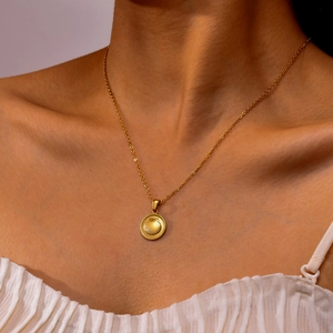 Gold stainless steel shell pendant necklace with round medallion on cable chain for women