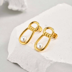 Elegant gold-plated stainless steel infinity knot drop earrings with round white pearls