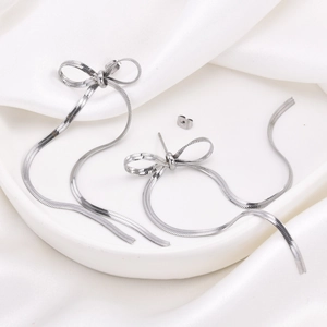Elegant silver bow earrings with fringe chain tassels crafted in stainless steel