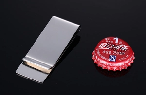 Polished stainless steel money clip with smooth mirror finish and rectangular fold design