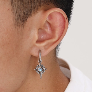 Vintage stainless steel moon star earrings with moonstone, worn as a celestial earring