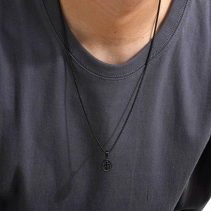 Men's vintage black stainless steel cross relief oval pendant necklace on a chain