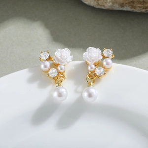 Elegant gold flower pearl drop earrings with white roses and sparkling rhinestones