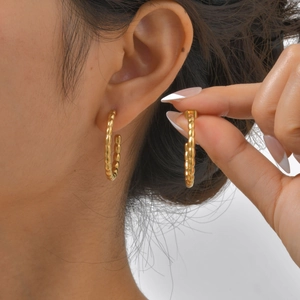 Chic gold stainless steel C-shaped hoop earrings with twisted rope texture for women