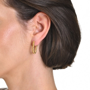 18K gold plated stainless steel beaded hoop earrings shown on model for women