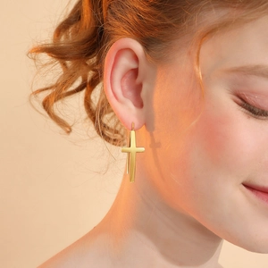 Boucles d'oreilles pendantes croix dorées en acier inoxydable poli pour femmes