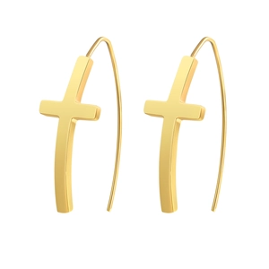 Paire de boucles d'oreilles pendantes croix en acier inoxydable doré sur fond blanc