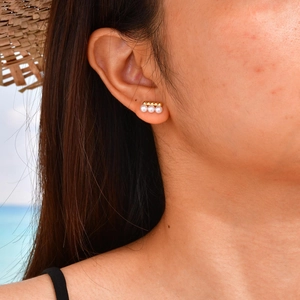 Elegant French style stainless steel earrings with three pearls and gold stud details