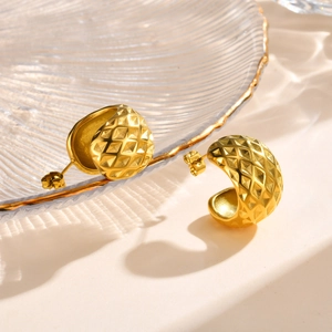 Detailed view of 18K gold-plated C-shape earrings with intricate rhombus pattern texture