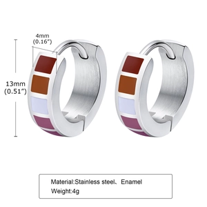 Detail of 13mm stainless steel huggie earrings with colorful enamel inlay pattern