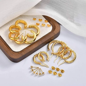 Three-piece gold stainless steel earring set with twisted hoops and zircon studs